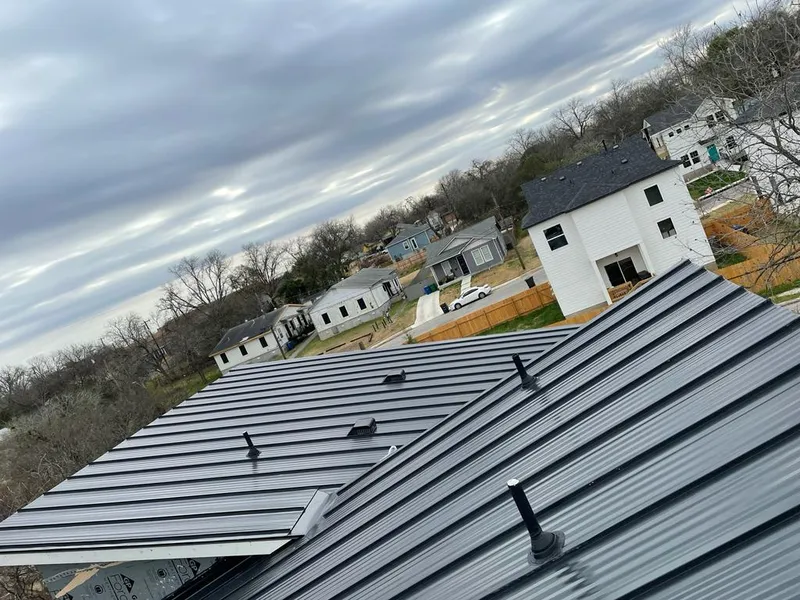 Standing seam metal roof panels with vents for Skylight Repair in Alma
